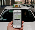 Proteste in Franta fata de aplicatia Uber. Soferii de taxi au blocat un aeroport din Paris