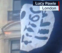 CNN a vazut un steag ISIS in timpul unei parade de pe strazile Londrei. Ce era insa de fapt desenat pe panza neagra