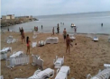 VIDEO. Plaja Chernomorka din Odesa, plina de turisti, a fost INECATA de un tsunami