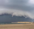 Imagini spectaculoase pe o plaja din Constanta. Ce s-a intamplat dupa ce a aparut norul amenintator. FOTO