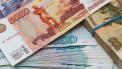 Rubla se prabuseste. Moneda ruseasca a ajuns la cea mai joasa cotatie fata de dolar si euro de pana acum