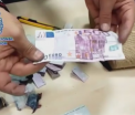Captura uriasa a Politiei de frontiera din Spania. Cati bani au gasit in talpa pantofilor unei femei care zbura spre Columbia