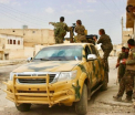 Trump a aprobat inarmarea luptatorilor kurzi pentru a cuceri capitala ISIS, Raqqa. Reactia regimului Erdogan