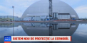 Noul sarcofag care acopera reactorul avariat in urma exploziei, prezentat la Cernobil