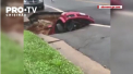 O masina a fost “inghitita” complet de o gaura formata in asfalt. Incidentul a avut loc in orasul ameican Dale City, lovit de o furtuna zilele trecute - VIDEO