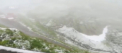 Muntii Bucegi din Romania au fost acoperiti de un strat de zapada de 3 centimetri, iar termometrele au aratat minus 2 grade. Meteorologii sustin ca ultimii fulgi au cazut acolo in mijlocul verii acum opt ani - VIDEO