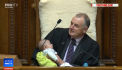 Presedintele Parlamentului din Noua Zeelanda  a devenit subiect de stiri in toata lumea, dupa ce a fost surprins cum hraneste un bebelus, chiar in timpul unei sedinte - VIDEO