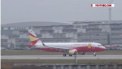 Un chinez care zbura pentru prima data a fost amendat pentru ca a aruncat monede in motorul avionului... ca sa-i poarte noroc