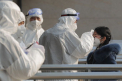 Virusul mortal din China. 41 de morti, 1.300 de contaminati si milioane de locuitori blocati