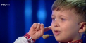 A recitat versuri care au emotionat mii de spectatori si internauti. Un baietel din Chisinau a pasit increzator pe scena de la “Romanii au talent" - VIDEO