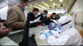 Numarul deceselor cauzate de coronavirus a trecut de 900. Doi romani din Hubei au fost repatriati