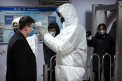 Un asistent medical suspect de infectie cu coronavirus in Romania