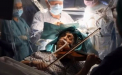 O femeie a cantat la vioara in timp ce doctorii ii scoteau o tumoare din creier - VIDEO