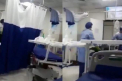 „E viu!” Pacient diagnosticat cu coronavirus, bagat intr-un sac pentru cadavre cat inca respira. Imaginile au fost publicate de un jurnalist celebru, in Iran - VIDEO