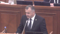 Huiduit si alungat din sala, Ion Chicu a reusit, din a patra tentativa, sa-si asume raspunderea pentru un set din patru legi in fata Parlamentului - VIDEO