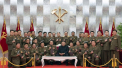 Kim Jong-un le-a daruit generalilor sai pistoale la aniversarea a 67 de ani de la incheierea razboiului intre Nord si Sud