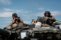 Un militar rus si-a ingrozit sotia dupa ce a sunat-o sa-i spuna ce face pe frontul din Ucraina: "Au plans, m-au implorat sa nu-i omor, i-am impuscat oricum"