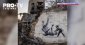 Celebrul artist anonim Banksy pare ca confirma ca se afla in Ucraina. Ultima sa lucrare fiind desenata pe zidul unei cladiri bombardate din orasul Borodianka - FOTO