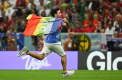 Ce nu s-a vazut la TV. Mesajele cenzurate transmise de fanul care a intrat pe teren la Portugalia - Uruguay - FOTO 