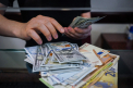 Curs valutar BNM pentru 11 aprilie. Cat costa astazi un euro si un dolar - FOTO