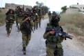 Raid israelian in satul natal al numarului 2 din Hamas: Fratele si 9 dintre nepotii lui al-Arouri au fost arestati si a fost pus un banner cu un mesaj pentru liderul islamist - FOTO