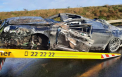 Resturi dintr-un Bentley de lux, imprastiate pe 900 de metri de autostrada. Pasagerul a fost aruncat din masina, la 250 km/h, si a murit, in Germania - FOTO
