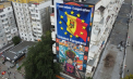 Autoritățile locale despre pictura murală „Visul Olimpic” care este acum acoperită de un uriaș panou publicitar: „Agentul economic nu avea autorizația”. Reacția companiei - VIDEO