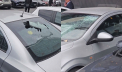 Ghinion pentru câțiva șoferi din capitală: O bucată de teracotă de pe o clădire a căzut peste mașinile lor - VIDEO