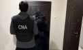 Percheziții la Bălți. Un avocat și un complice - reținuți de ofițerii CNA: Ar fi primit aproape 50 mii de euro în schimbul promisiunii de a influența deciziile unor procurori și judecători - FOTO