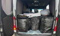 Contrabanda nu funcționează nici de sărbători: Ce au găsit ofițerii Serviciului Vamal în microbuzul unui moldovean - FOTO/VIDEO