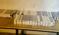 Peste 500 de pachete de țigări și 15 sticle de alcool - găsite de vameși în microbuzul unui moldovean care vroia să iasă din țară, la vama Albița. Unde erau ascunse acestea - FOTO