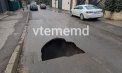 Atenție, șoferi. Un crater uriaș s-a format pe o stradă din capitală, după ce asfaltul s-a surpat. Ce spune primăria - VIDEO