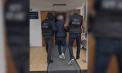 Au încercat să mituiască un polițist de frontieră, pentru a crea un canal de migrație ilegală. Un turc și o moldoveancă - reținuți pe Aeroportul Internațional Chișinău - VIDEO