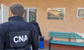 Luau mită sistematic. Un angajat al Inspectoratului pentru Protecția Mediului și reprezentantul unui agent economic - cercetați de CNA. Ofițerii au descins cu percheziții - VIDEO