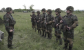 Au pus viața cotidiană pe pauză și s-au mutat în corturi, pe poligon, unde au tras la țintă și au efectuat diferite exerciții. Sute de rezerviști ai armatei naționale - încorporați din nou în armată pentru o perioadă de antrenamente - VIDEO