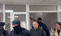 Directorul adjunct al sanatoriului Speranța, reținut în mai multe dosare de corupție pasivă, trafic de influență și delapidari în achiziții publice - adus în fața magistraților - VIDEO