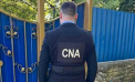 Percheziții la proprietarul companiei de construcții care a efectuat lucrările blocului locativ din Durlești afectat de incendiu. Ce au găsit ofițerii CNA - VIDEO