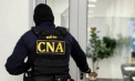 „Eu aici o să vorbesc și o să ne dea 20 de camazuri”. Mai multe persoane, printre care un primar, un avocat, un agent economic și un ex-polițist, cercetați de CNA pentru mită de 12 milioane de lei - AUDIO