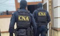 PA și ofițerii CNA au descins cu percheziții pentru posibile fapte de corupere activă și pasivă ale unor persoane implicate în implementarea și aplicarea amnistiei