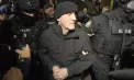 Horațiu Potra a fost adus încătușat în România după nouă luni sub escorta poliției române. Este acuzat de tentativă de lovitură de stat alături de Călin Georgescu
