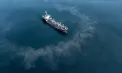Bulgaria intervine pentru salvarea unui petrolier rus sancționat, lovit de o dronă ucraineană, aproape eşuat lângă coastă - VIDEO 
