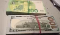 A pornit spre Paris cu aproape 14 mii de dolari și 10 mii de euro, dar „a uitat” să-i declare. Un pasager - documentat pe Aeroportul Internațional Chișinău - FOTO