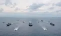 Zeci de nave și avioane de vânătoare trimise de SUA lângă Iran: Intimidare și opțiuni de atac înaintea negocierilor nucleare de la Geneva