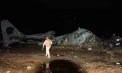 Un avion militar încărcat cu bani s-a prăbușit în Bolivia: cel puțin 15 morți. Confruntări între poliţie şi oamenii veniţi să adune bancnotele - VIDEO 