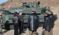 Kim Jong Un și-a pus fiica adolescentă să conducă un tanc. Ce spun analiștii - FOTO