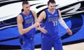 Moment spectaculos în NBA: jucătorii de la Dallas au sărbătorit victoria din prelungiri în stil total, iar marcatorul a fost stropit cu bere din tribune - VIDEO