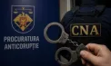 Ar fi promis eliberarea unui condamnat în schimbul a 30 de mii de euro. Un bărbat, reținut pentru 72 de ore de CNA