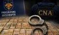 Mai multe produse neconforme ar fi intrat în Republica Moldova, după ce inspectorii ANSA de la Leușeni au luat mită de la agenți economici. O persoană, reținută de CNA