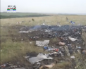La un an de la tragedie au aparut imagini video atribuite separatistilor. Ce faceau ei dupa ce s-a prabusit avionul in zona de est a Ucrainei - VIDEO