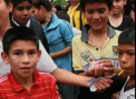 "Festivalul saracilor" in Paraguay. Traditional, copii sarmani primesc bani - VIDEO